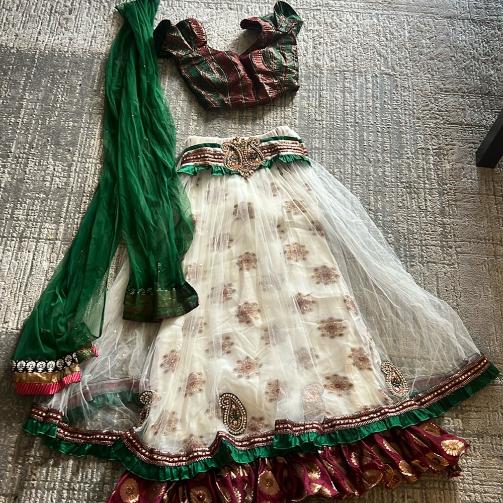 green, red, and white lehenga